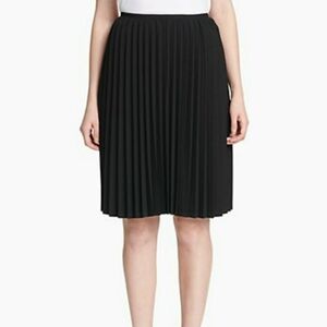 Womens black pleated skirt by Calvin Klein.